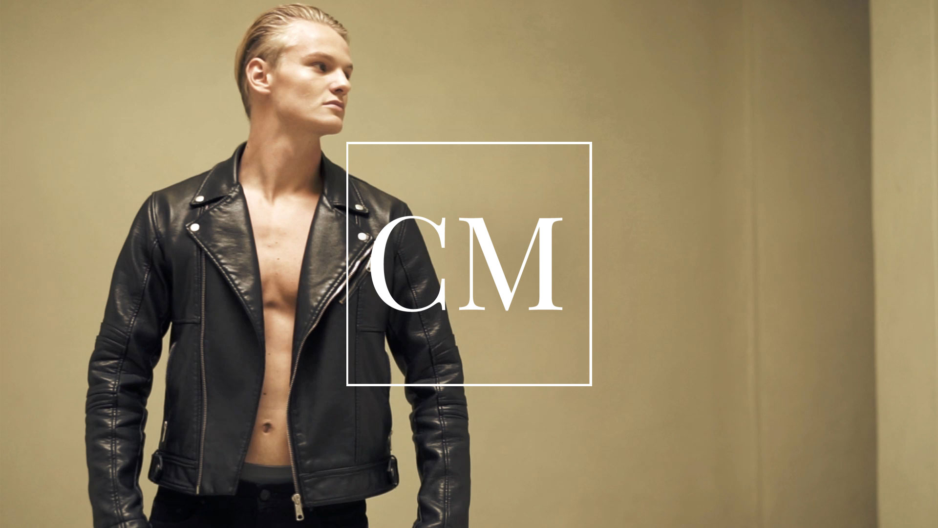 louise-male-model-modeling-agency-new-face-fashion-leather-jacket-wall-posing-man